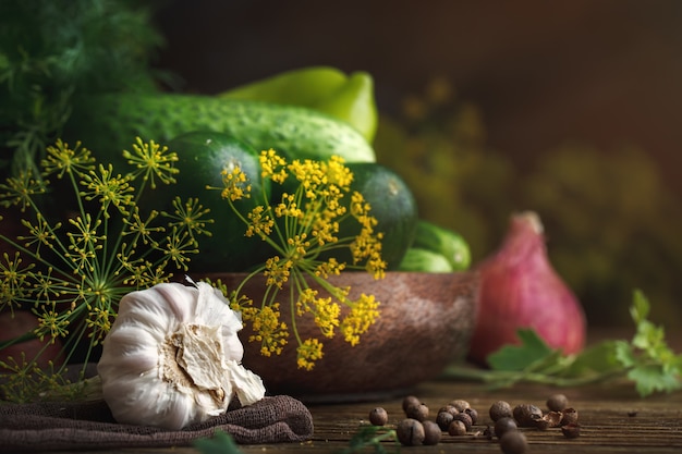 Summer still life of ripe vegetables and dill.