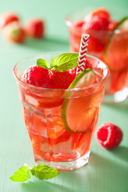 Summer strawberry raspberry lemonade with lime and mint