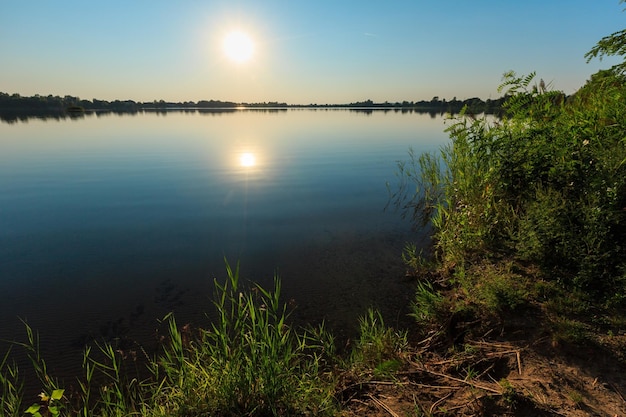 Summer sunset lake calm beach