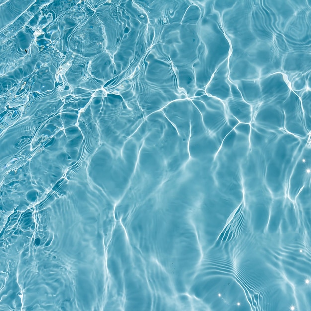 夏の水泳プールの海面水面 波の質感の背景