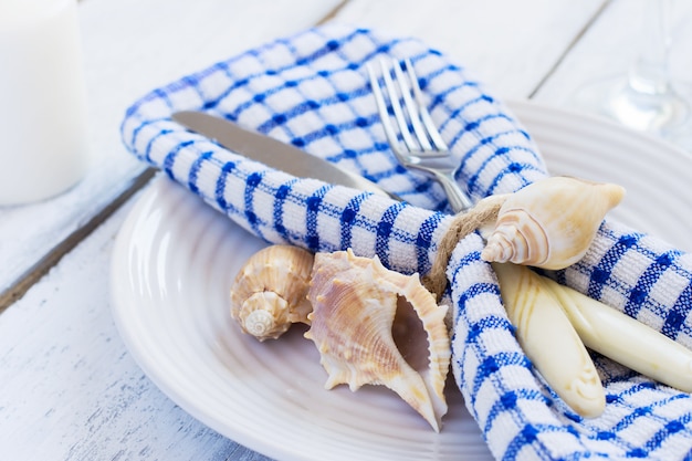 Summer table setting in marine style