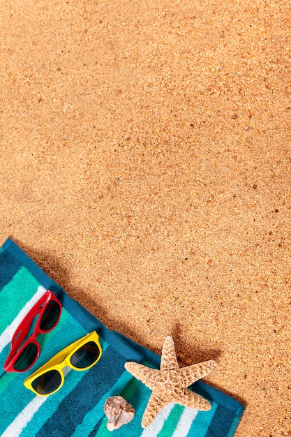 Summer vacation beach background border, sunglasses, sand 