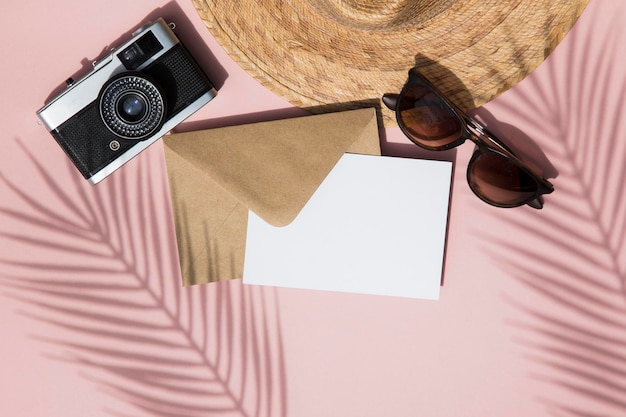 Summer vacation blank card composition Tropical leaf shadow camera glasses