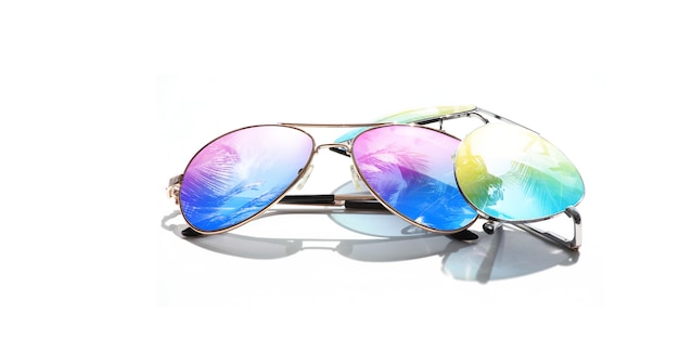 Summer vacation concept. Sunglasses with ocean beach and palms.