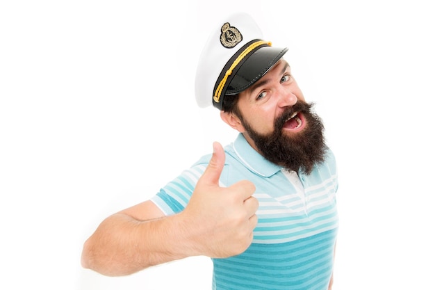 夏休み。流行に敏感なあごひげの口ひげの船乗りの帽子。クルーズ客船の船長。白で孤立した残忍な船員。キャプテンコンセプト。ようこそ。船のひげを生やした男の船長。シークルーズ。旅行のコンセプト。