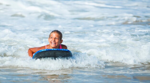 Summer vacation surfer girl