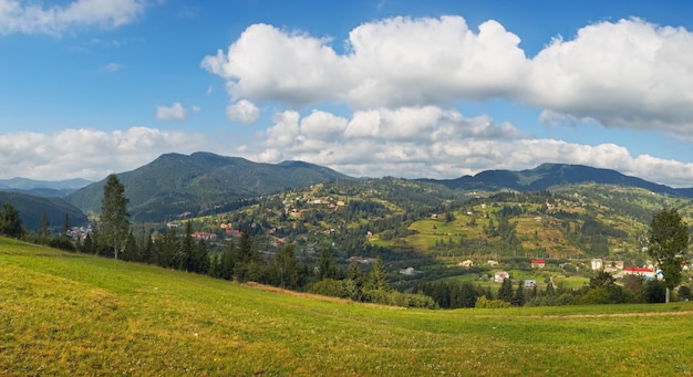 Summer view of mountain village outscirts