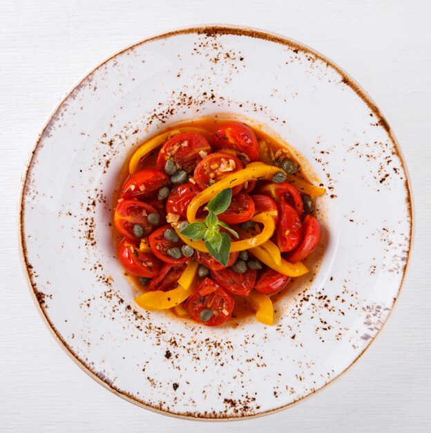 Summer warm salad with cherry tomatoes,sweet peppers