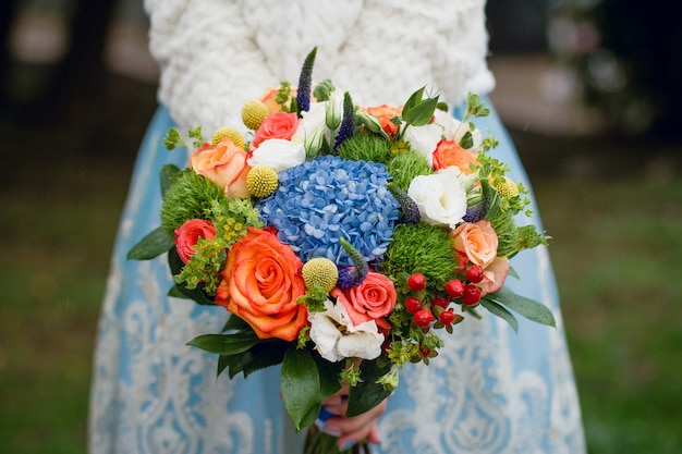 summer wedding bouquet. Delicate bright flowers for girl