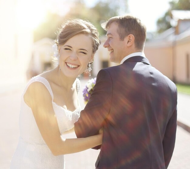 summer wedding photo of bride and groom