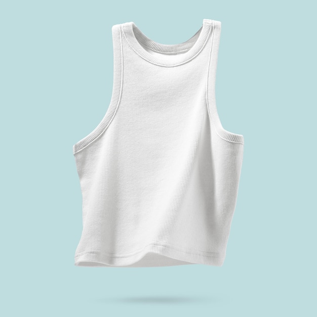 Photo summer women's clothing ribbed white tank top flying on light blue background female comfortable cotton cloth creative template for design mock up copy space