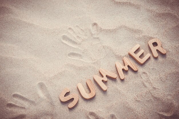 Summer Wooden letters on the sand