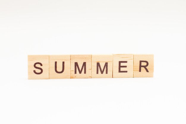 SUMMER words on wooden blocks isolated