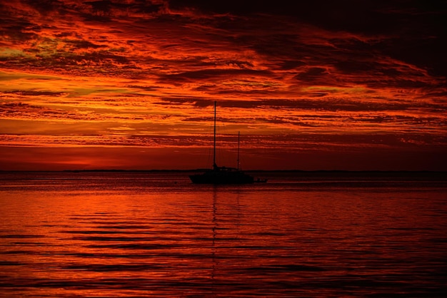 Summer yachting cruise Sailboats at sunset Ocean sea yacht sailing on water