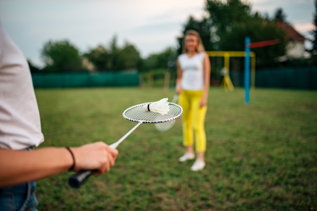 Summertime fun. Playing badminton.