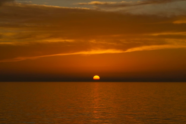 The sun disk diving in the sea