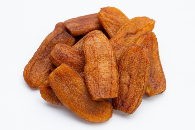 Sun dried bananas on white background.