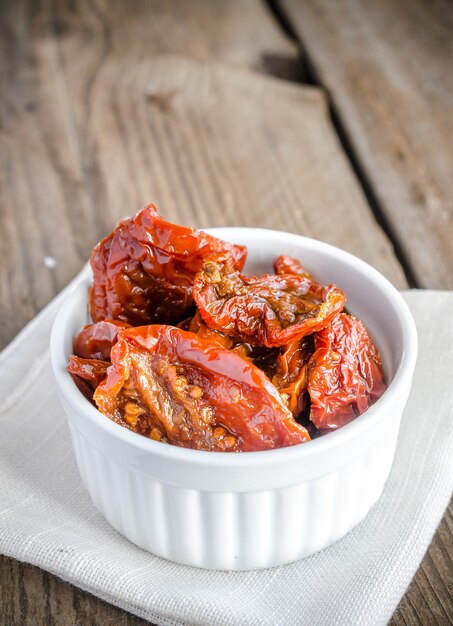 Sun dried tomatoes on white bowl