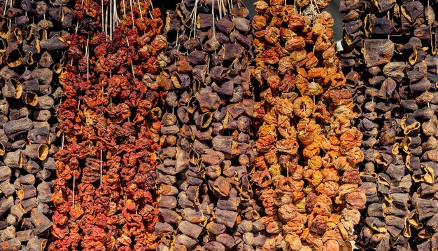 Sun dried vegetables hanging up at Turkish grocery