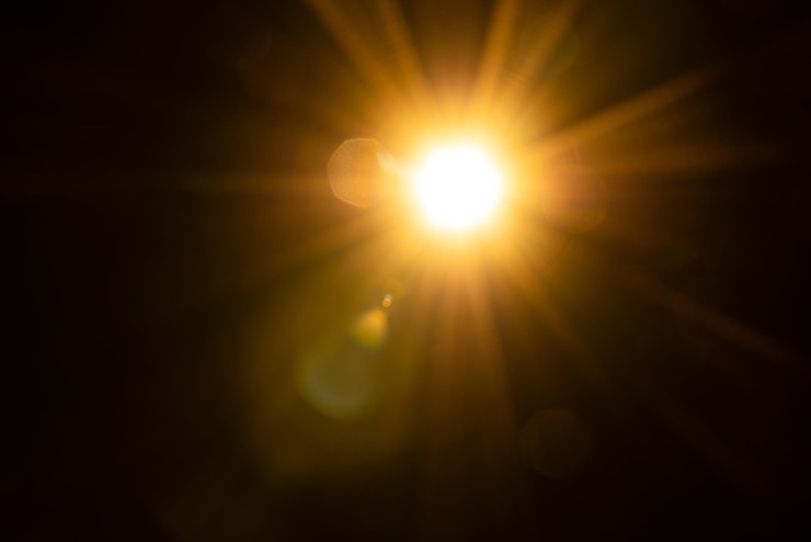 Photo sun flare on the black background