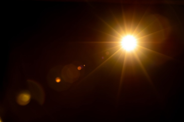 Photo sun flare on the black background