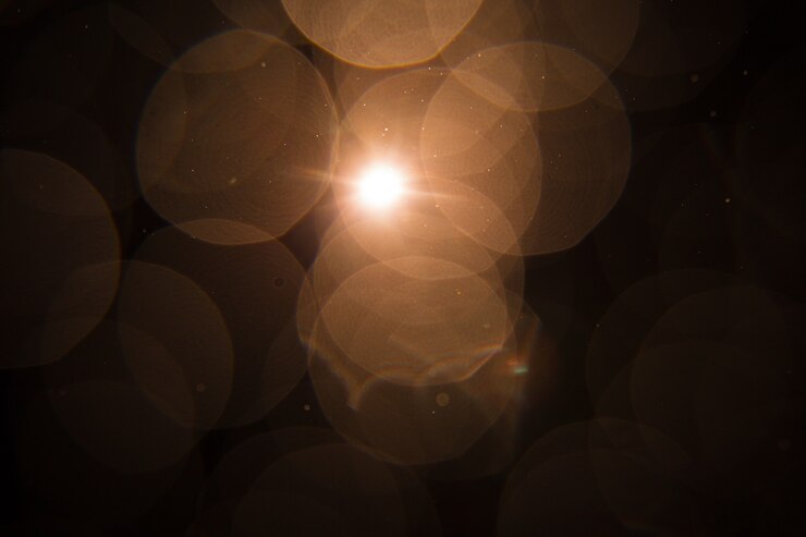 Foto sun flare op zwart objectontwerp.