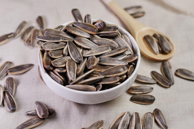 Sun flower seeds in a bowl on table