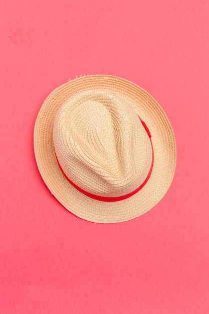 Sun hat on color background.