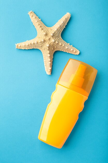 Sun protection bottle with starfish. Top view.