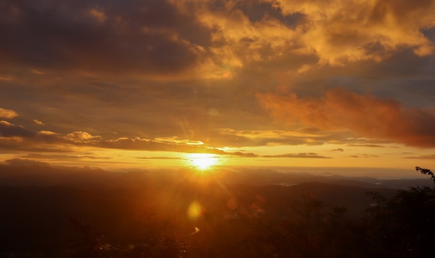 Sun rises over the mountains beautiful winter morning