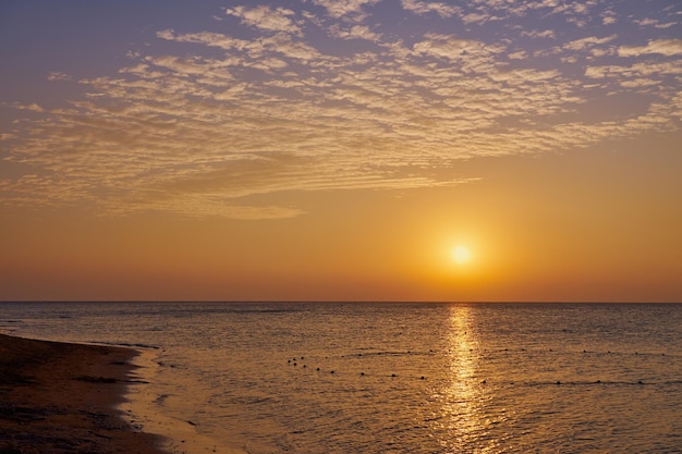 The sun rises over the Red Sea at dawn