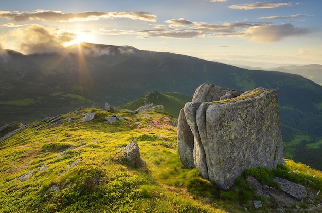 Sun setting behind the mountain