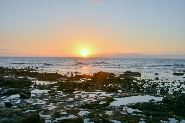 The Sun Setting in the Sea