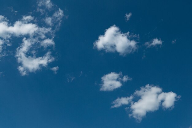 Sun shining above beautiful stormy clouds, sky is clearing after rain