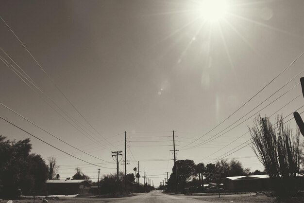 Sun shining over road