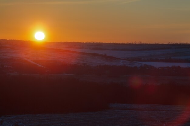 Sun at sunset in early winter.