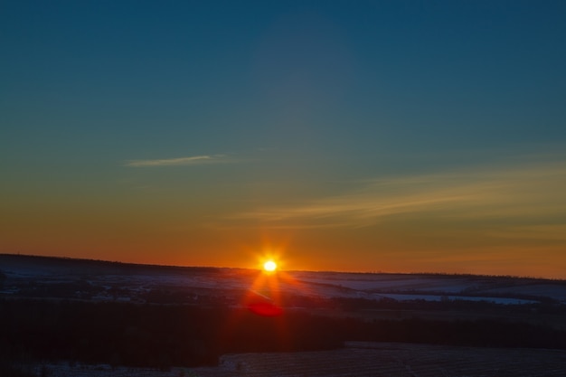 Sun at sunset in early winter.