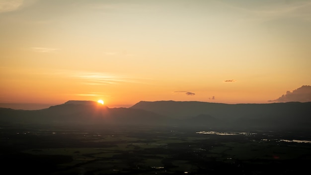 The sun was setting on the edge of the ridge Mountain. sunset