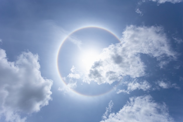 Sun with circular rainbow in day time