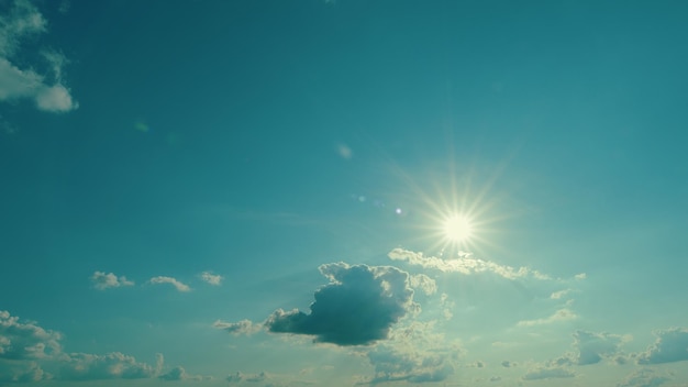 Sunbeam with haze on blue sky beams with clouds sky with sun coming with clouds