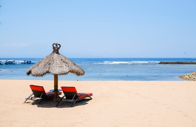 Sunbeds on the ocean beach