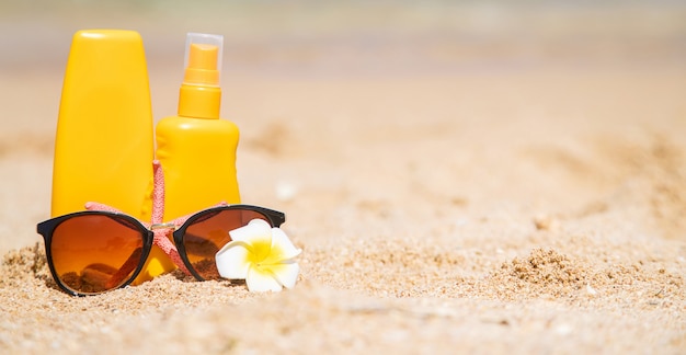 Sunblock on the beach. Sun protection. 