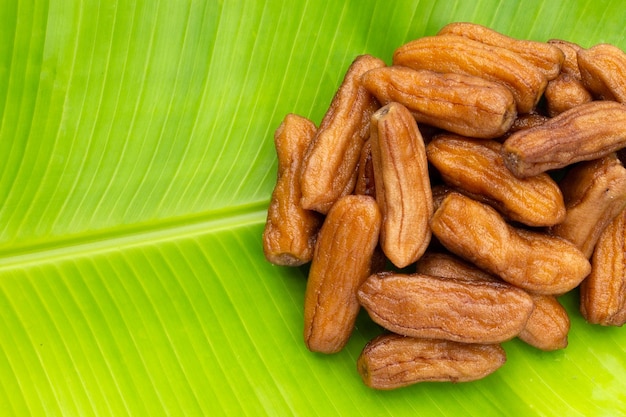 Sundried bananas on banana leaf