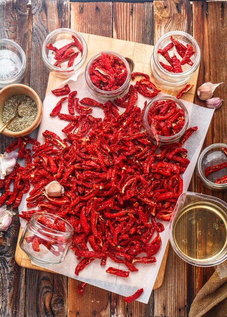 Sundried tomatoes preparation top view flat lay