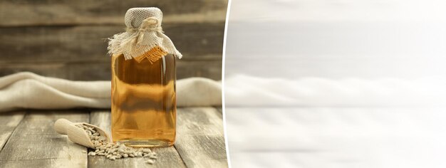 Sunflower bottle of oil and seeds on the table