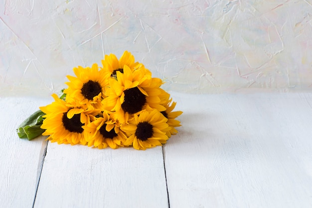 sunflower bouquet on a wooden table