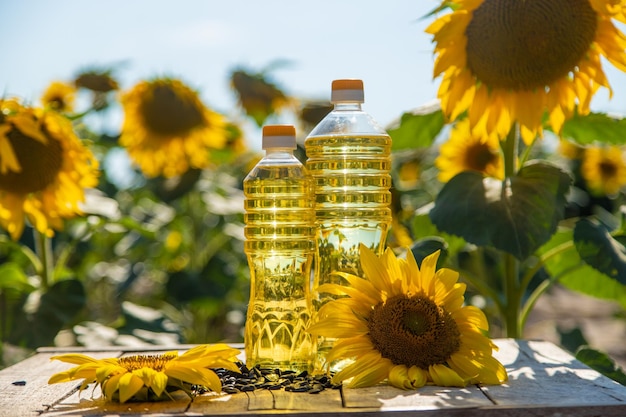 Sunflower oil in a bottle on the field Selective focus