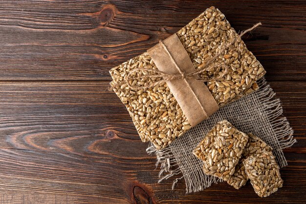 Sunflower seed kozinaki on the wooden table