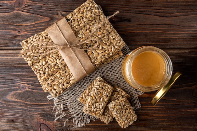 Sunflower seed kozinaki on the wooden table