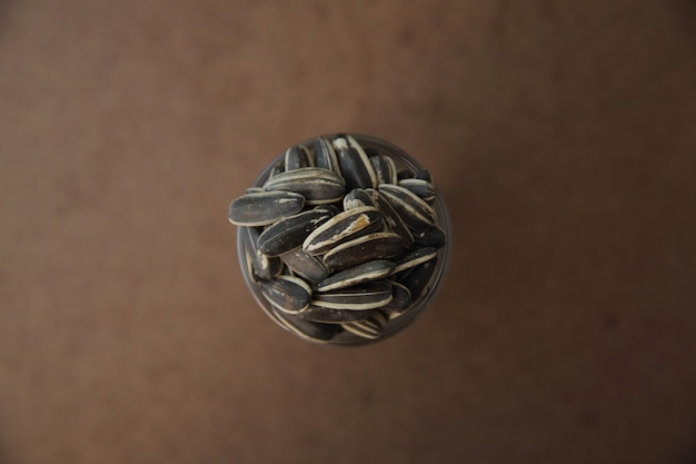 Sunflower seeds on wood background